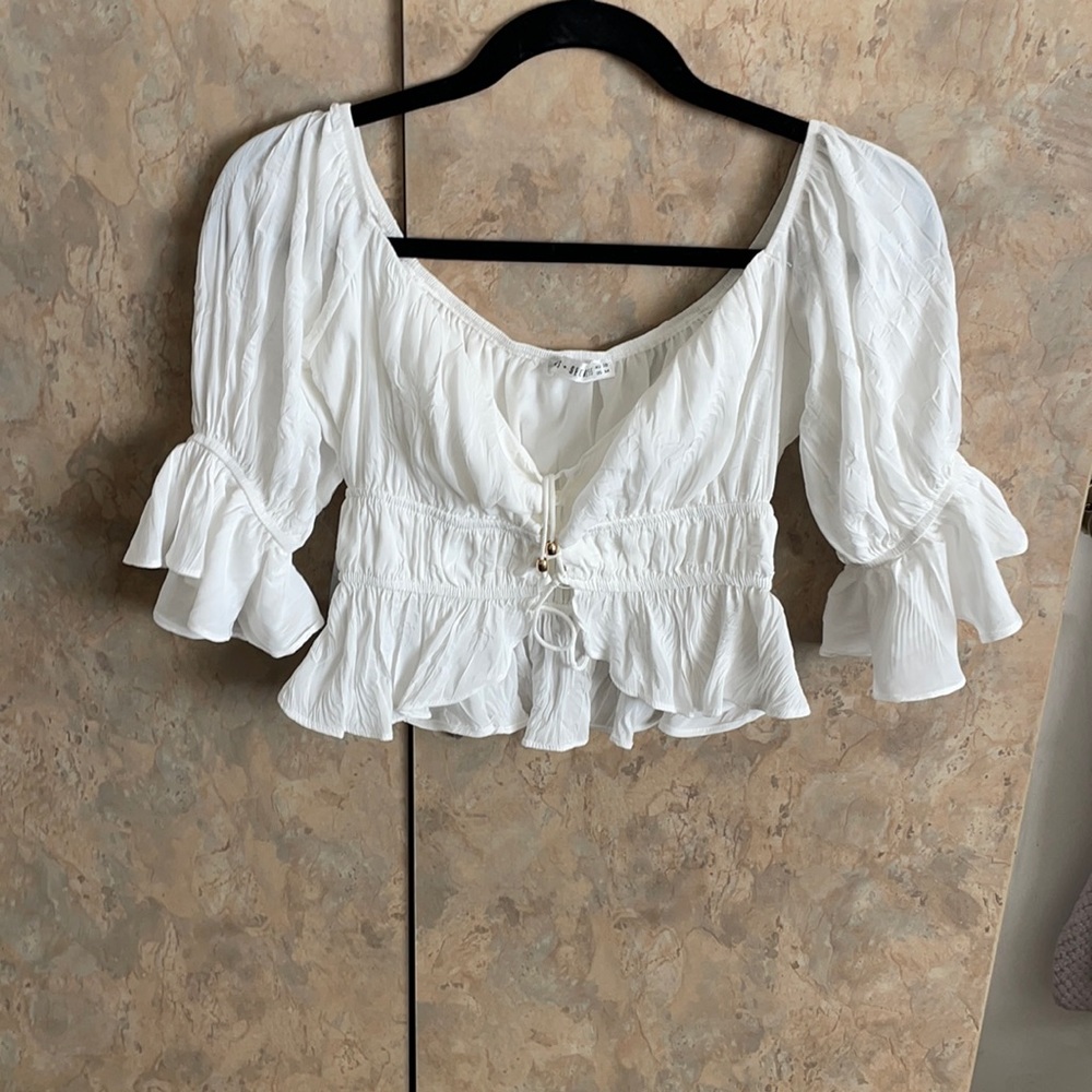 Saints and Secrets peasant top